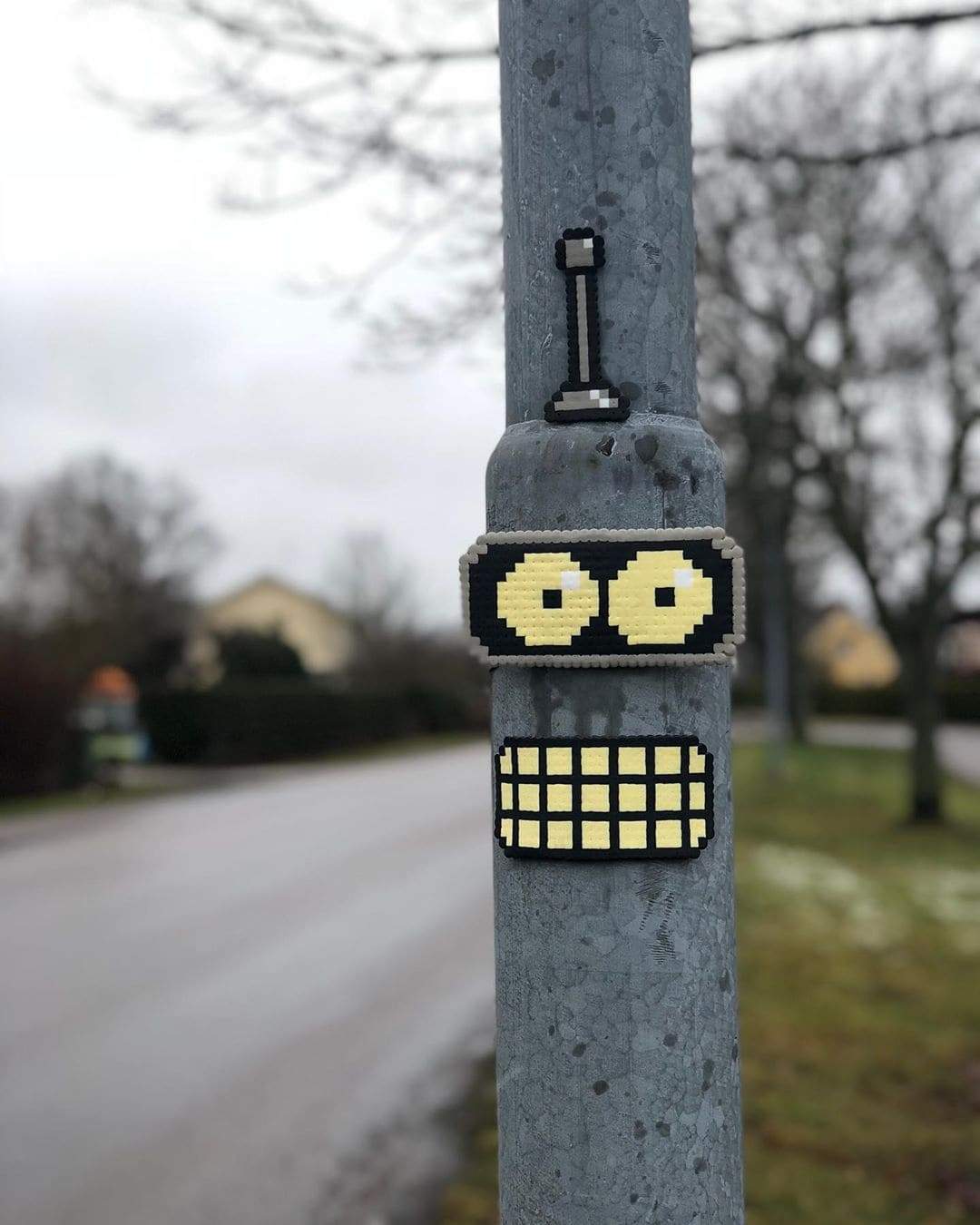 robot sur un poto street art